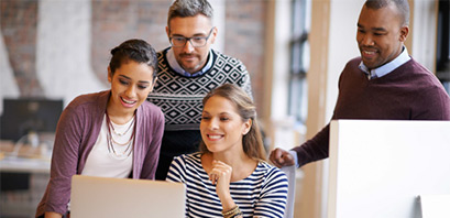 a group of employees watching laptops’ screen