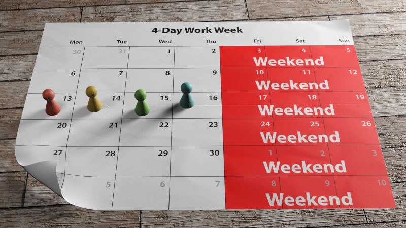 calendar showing a 4-day work week with multicolored pins on monday, tuesday, wednesday and thursday