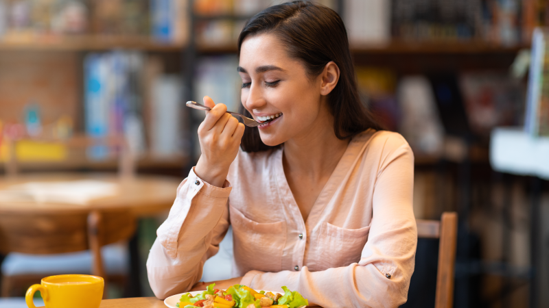 woman enjoying her meal