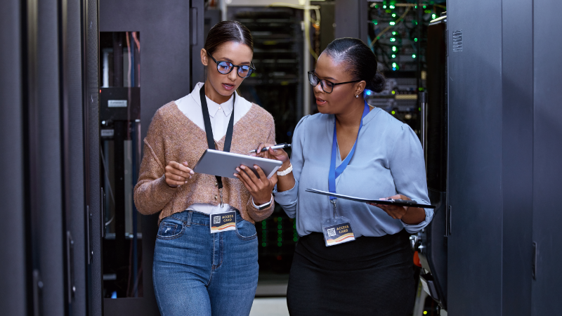 Third-party engineers having a discussion in a server room