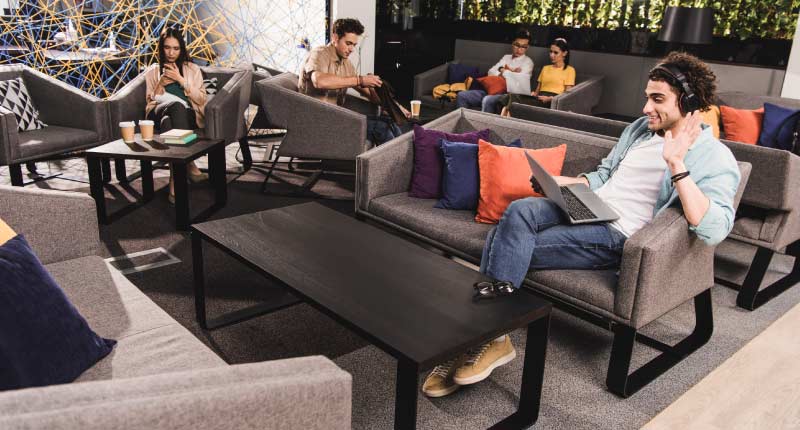 employees happily working in the modern office workspace